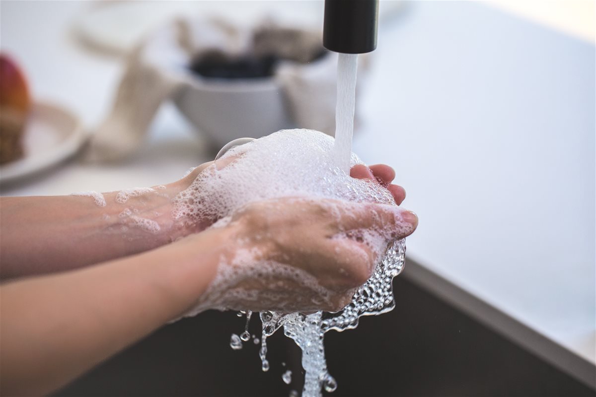 person-washing-his-hand-545014